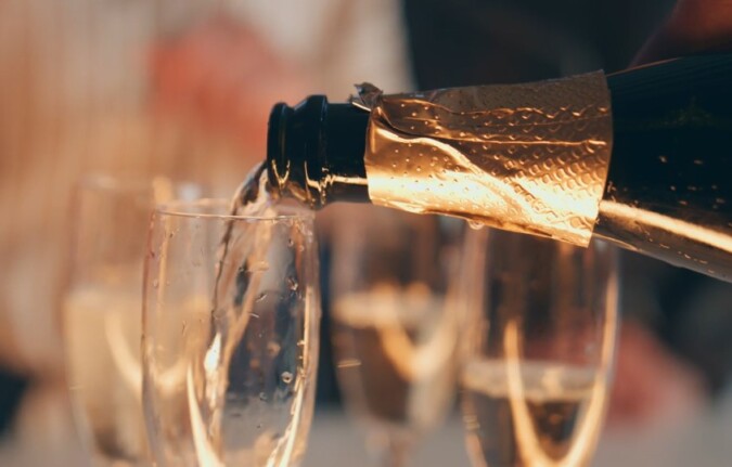 Champagne being poured into a glass