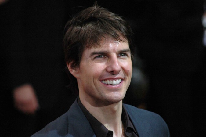 Tom Cruise smiling at a public event